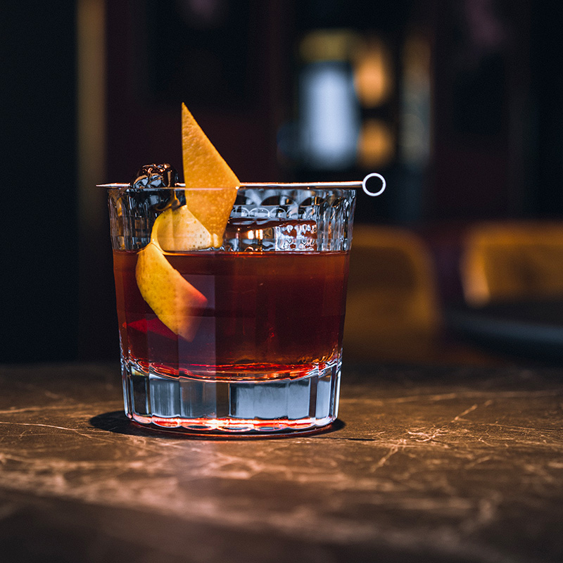 Fireside Old Fashioned in short glass with orange twist